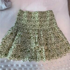 Green ruffle mini skirt